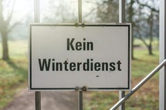 Warning sign with the German label `No winter service` at the entrance of a park stock image Warning sign with the German label `No winter service` at the entrance of a park stock image