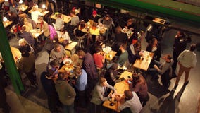 WARSAW, POLAND - DECEMBER, 21, 2016. People eating in the cafe. 4K view from above shot stock footage WARSAW, POLAND - DECEMBER, 21, 2016. People eating in the cafe. 4K view from above shot stock footage