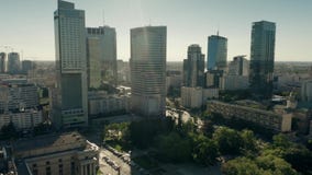 WARSAW, POLAND - JUNE 5, 2019. Aerial view of skyscrapers of business district in city centre stock video WARSAW, POLAND - JUNE 5, 2019. Aerial view of skyscrapers of business district in city centre stock video