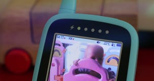Baby boy in the babyphone monitor