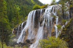 Water fall sounded by green trees. Like a very beautiful place Stock Images Water fall sounded by green trees. Like a very beautiful place Stock Images