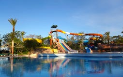 Water park reflection in swimming pool stock photography Water park reflection in swimming pool stock photography