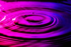 Water ripples on nice purple blue background. royalty free stock photo Water ripples on nice purple blue background. royalty free stock photo