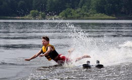 Water Skier Falling And About To Crash Into A Lake Stock Photos