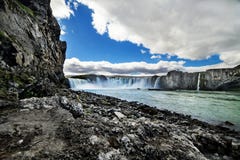 A waterfall in a beautiful rocky Iceland landscape. Royalty Free Stock Image A waterfall in a beautiful rocky Iceland landscape. Royalty Free Stock Image