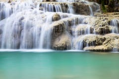 Waterfall cascading over a shelf of rocks royalty free stock photography Waterfall cascading over a shelf of rocks royalty free stock photography