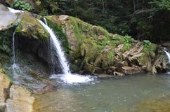 Waterfall nature water forest green. Blue day Royalty Free Stock Photos Waterfall nature water forest green. Blue day Royalty Free Stock Photos