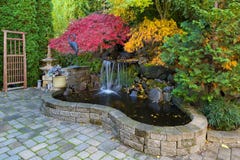 Waterfall Pond in Home Backyard during Fall Season stock photo Waterfall Pond in Home Backyard during Fall Season stock photo
