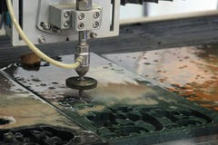 Waterjet l krajacz obrazy royalty free Waterjet l krajacz obrazy royalty free
