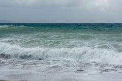 Waves in a bay of the Aegean Sea in Rhodes royalty free stock photos Waves in a bay of the Aegean Sea in Rhodes royalty free stock photos