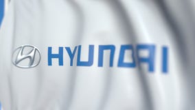 Waving flag with Hyundai Motor Company logo, close-up. Editorial loopable 3D animation vector illustration Waving flag with Hyundai Motor Company logo, close-up. Editorial loopable 3D animation vector illustration