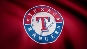 USA - NEW YORK, 12 August 2018: Waving flag with Texas Rangers professional team logo. Close-up of waving flag with vector illustration USA - NEW YORK, 12 August 2018: Waving flag with Texas Rangers professional team logo. Close-up of waving flag with vector illustration