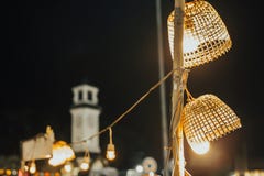 Weave bamboo basket lamp on the night stock image Weave bamboo basket lamp on the night stock image
