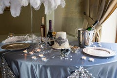 Wedding banquet table decorated with cake and candles on a blue tablecloth royalty free stock images Wedding banquet table decorated with cake and candles on a blue tablecloth royalty free stock images
