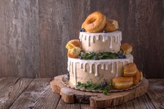 Wedding Cake Decorated With Donuts And Wild Berries. Stock Photos Wedding Cake Decorated With Donuts And Wild Berries. Stock Photos