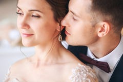 Wedding couple on the studio. Wedding day. Happy young bride and groom on their wedding day. Wedding couple - new family. Royalty Free Stock Photos Wedding couple on the studio. Wedding day. Happy young bride and groom on their wedding day. Wedding couple - new family. Royalty Free Stock Photos