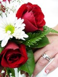 Wedding Ring And Bouquet Closup Royalty Free Stock Images