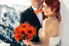 Wedding snowboarders couple just married at mountain winter Stock Photos Wedding snowboarders couple just married at mountain winter Stock Photos