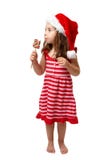 Weihnachtsmädchen mit Süßigkeit stockfotos Weihnachtsmädchen mit Süßigkeit stockfotos
