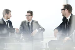 Welcome handshake business people sitting at the negotiating tab royalty free stock photos Welcome handshake business people sitting at the negotiating tab royalty free stock photos