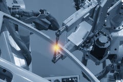 The welding robotic machine welding the automotive parts . royalty free stock image The welding robotic machine welding the automotive parts . royalty free stock image