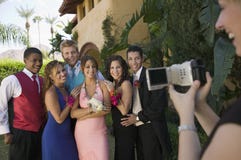 Well-dressed Teenagers Posing For Video Camera Royalty Free Stock Images Well-dressed Teenagers Posing For Video Camera Royalty Free Stock Images