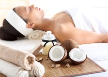 Wellness & spa treatment with coconut oil, feminine relaxation