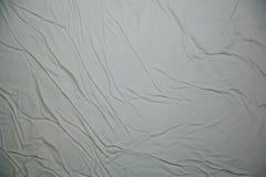 The wet texture of crumpled white paper or crumpled bed linen. royalty free stock photo The wet texture of crumpled white paper or crumpled bed linen. royalty free stock photo