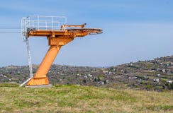 The wheel of the ski lift in the summer on top of the mountain stock images The wheel of the ski lift in the summer on top of the mountain stock images