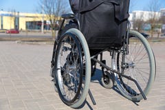 In wheelchair during walk in sunny day stock photography In wheelchair during walk in sunny day stock photography