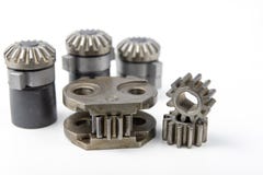 Wheels for mechanical gears on a white workshop table. Mechanica royalty free stock images Wheels for mechanical gears on a white workshop table. Mechanica royalty free stock images