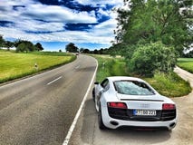 White Audi Coupe on Gray Concrete Road during Textile Stock Image White Audi Coupe on Gray Concrete Road during Textile Stock Image