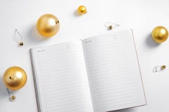 White background notepad hand writing new year resolution golden ball planning life smart goals royalty free stock images White background notepad hand writing new year resolution golden ball planning life smart goals royalty free stock images