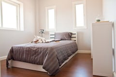 White Bedroom With Brown Sheet Bed Royalty Free Stock Images