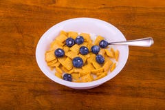 Crunchy Corn Cereal with Blueberries and Milk royalty free stock images Crunchy Corn Cereal with Blueberries and Milk royalty free stock images