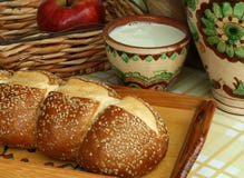 White Bread With Seeds And Milk In A Clay Pot Stock Photo White Bread With Seeds And Milk In A Clay Pot Stock Photo