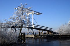 White Bridge In A Frozen Landscape Royalty Free Stock Photo