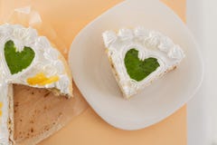 White cake on a colored background with ribbons shot from above stock photos White cake on a colored background with ribbons shot from above stock photos