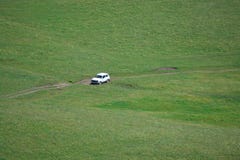 White car on the background of the hill. stock images White car on the background of the hill. stock images