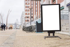 White clipped billboard in a pedestrian zone royalty free stock photo White clipped billboard in a pedestrian zone royalty free stock photo