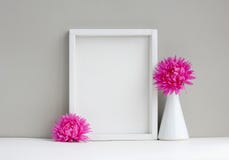 White frame mock-up, empty layout, vase with pink aster Stock Image White frame mock-up, empty layout, vase with pink aster Stock Image