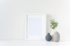 White frame mockup with vases composition