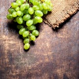 White grapes bunch over wooden background. Green grape, countr royalty free stock images White grapes bunch over wooden background. Green grape, countr royalty free stock images