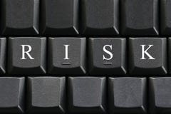 The white letter of Risk on computer keyboard background. The white letter of Risk on computer keyboard background for design in your Presentation Royalty Free Stock Image The white letter of Risk on computer keyboard background. The white letter of Risk on computer keyboard background for design in your Presentation Royalty Free Stock Image