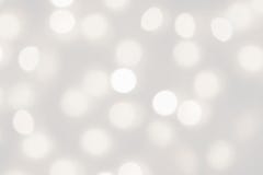 White lights bokeh blurred background, abstract beautiful blurry silver Christmas holiday party texture, copy space