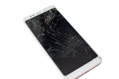 White phone with a broken sensor and screen, cracked touchscreen glass on a white background isolate stock photography White phone with a broken sensor and screen, cracked touchscreen glass on a white background isolate stock photography