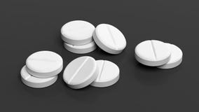 white-round-pills-isolated-black-background-61018132.jpg