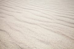 White sand with waves. Background texture royalty free stock photography White sand with waves. Background texture royalty free stock photography