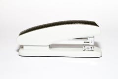 White stapler for paper on white background stock image White stapler for paper on white background stock image