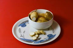 White sweet potato pieces slices protein food on red background royalty free stock photos White sweet potato pieces slices protein food on red background royalty free stock photos